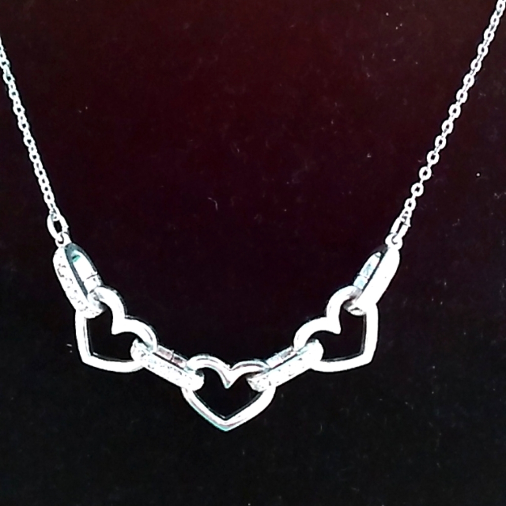 Oggie design 7 inch, 3 inch silver drop heart necklace.
